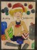 Eine Mangafigur mit Zipfelmütze und Weihnachtsgrüßen